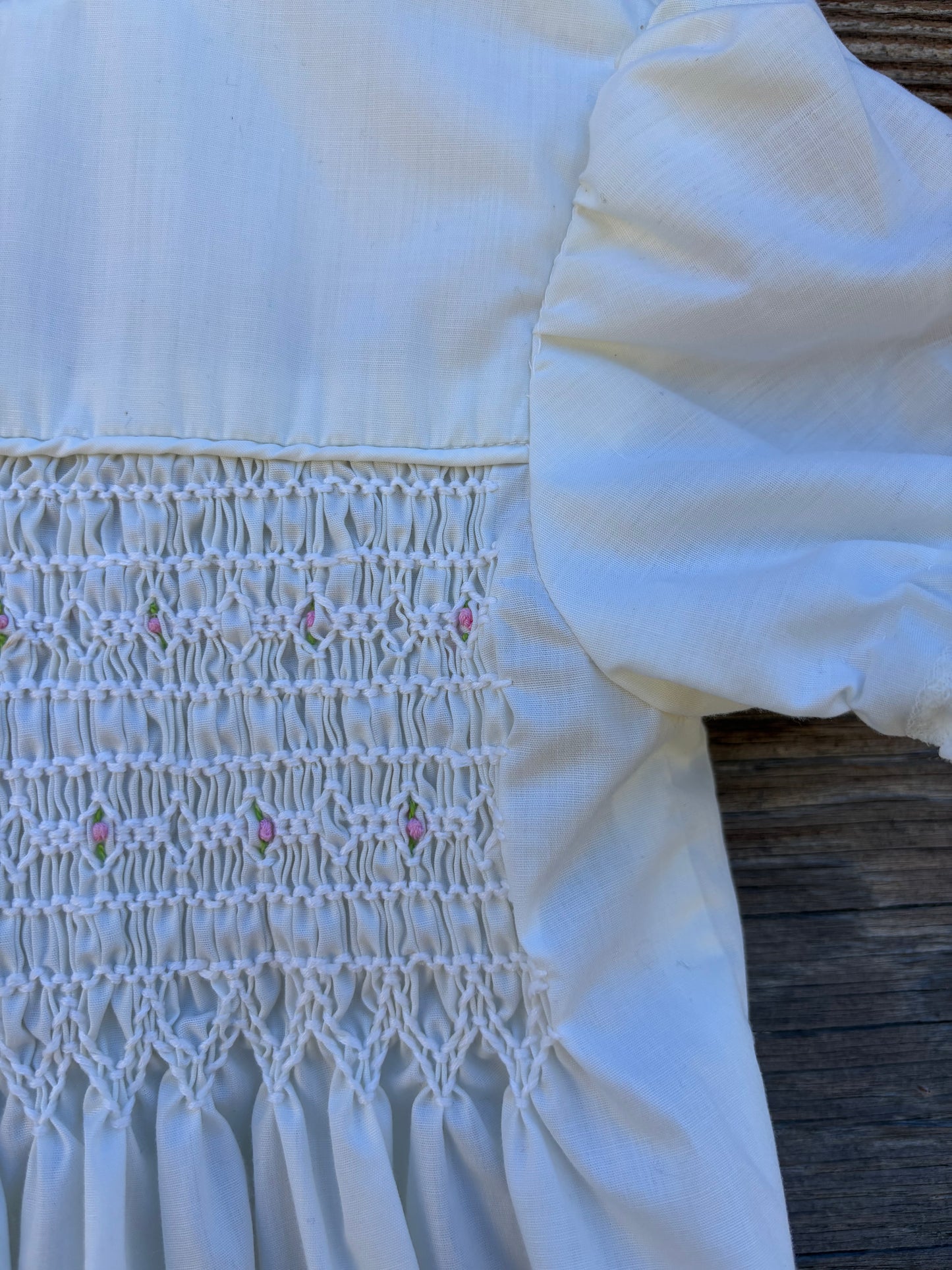 White smocked baby dress