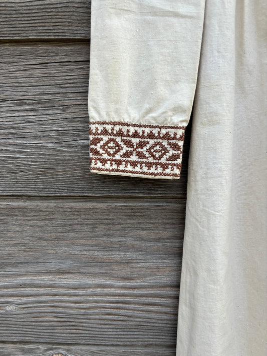 The villager embroidered white dress